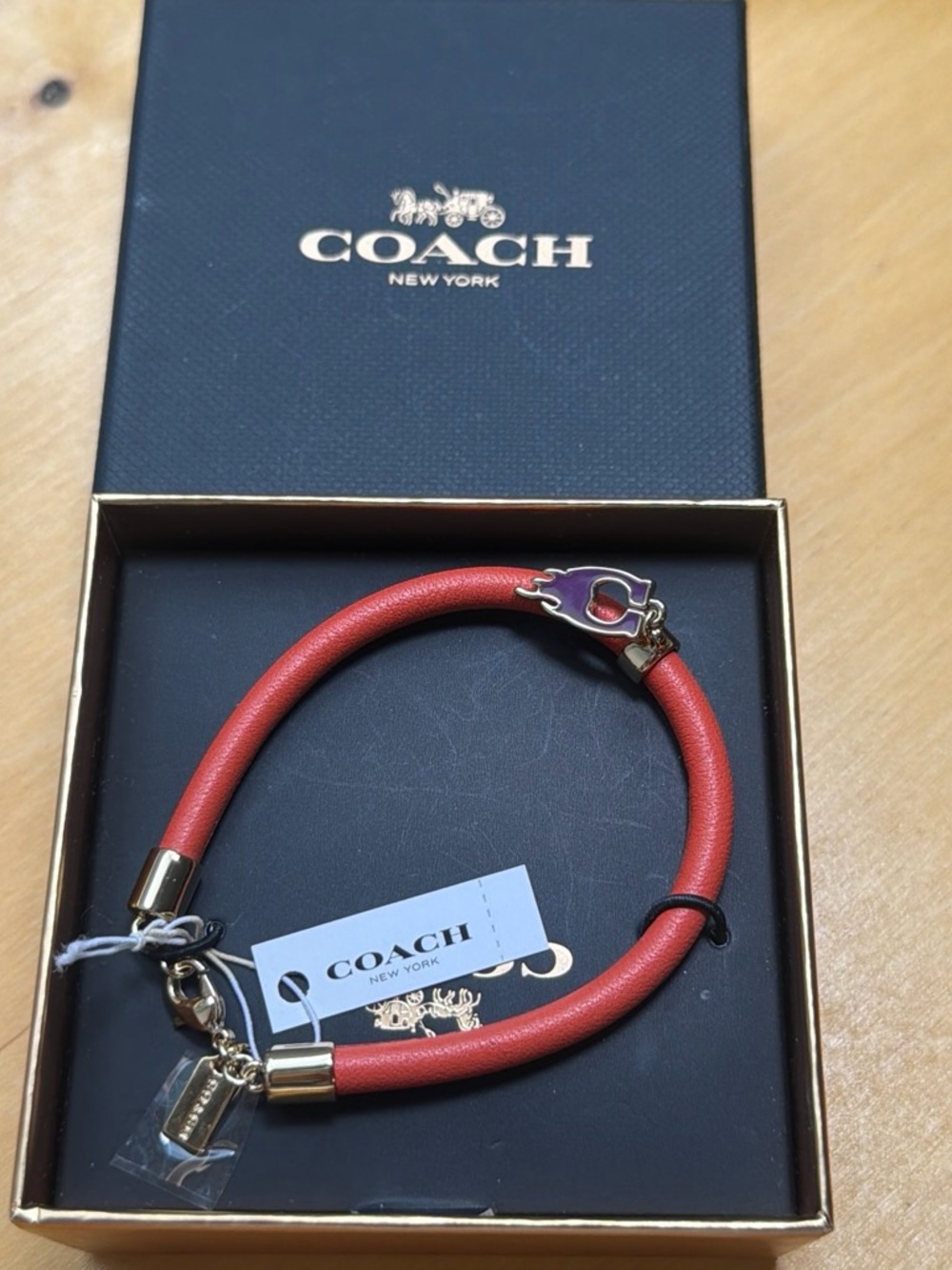 COACH Orange Leather Bracelet with Gold Hardware Brand New in a box